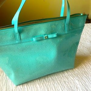 Kate Spade rubber vinyl exterior. Rayon cloth interior